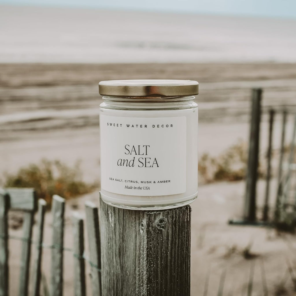 Sweet Water Decor Salt and Sea Candle - Sea Salt, Citrus, Amber, Musk, Beach Scented Soy Candles for Home - Coastal Decor for Beach Lovers - 9oz Clear Jar, 40 Hour Burn Time, Made in The USA