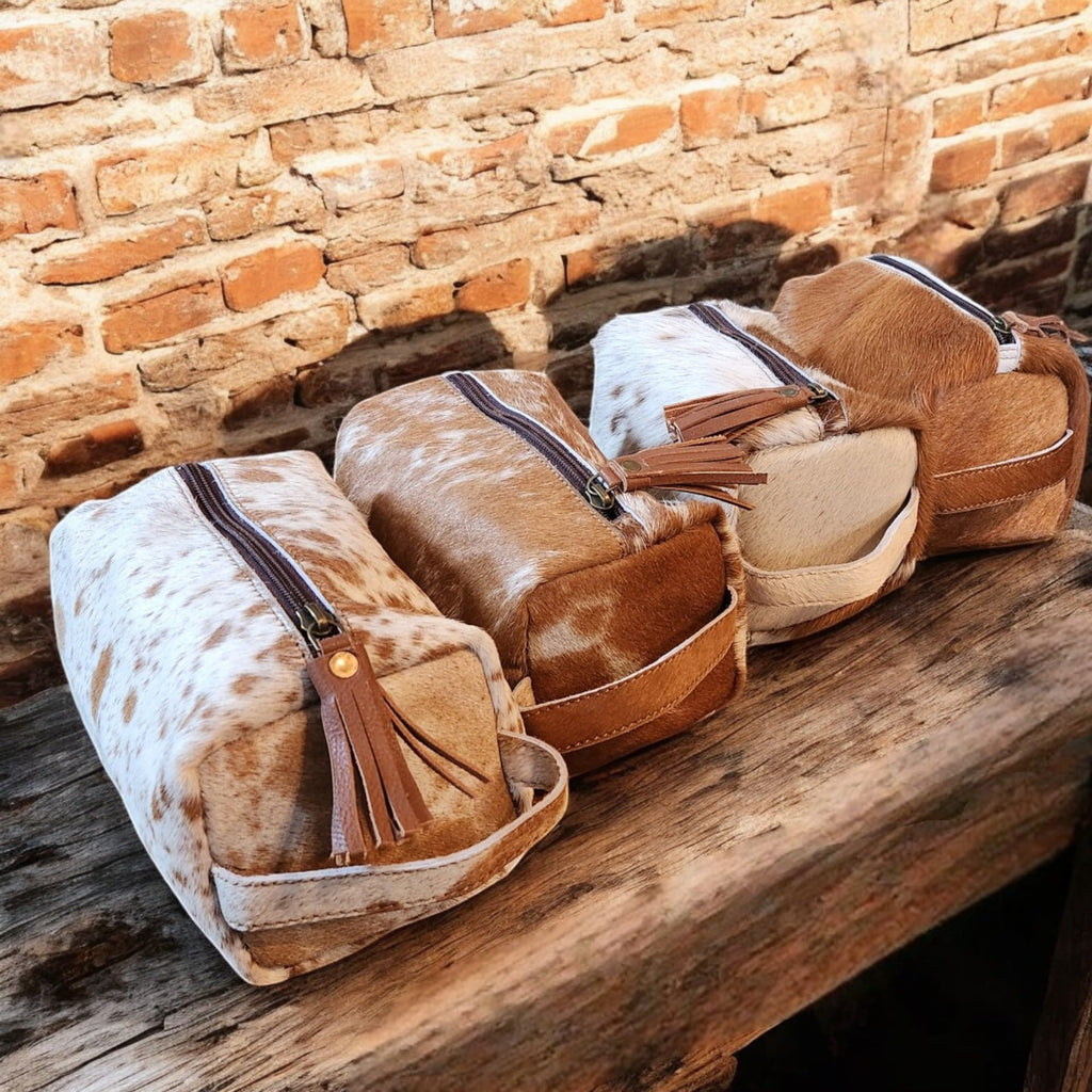 Ranch Junkie Mercantile Genuine Cowhide Handcrafted Cosmetic Pouch Highlands Cowhide Makeup Bag (Caramel Cowhide Mix)