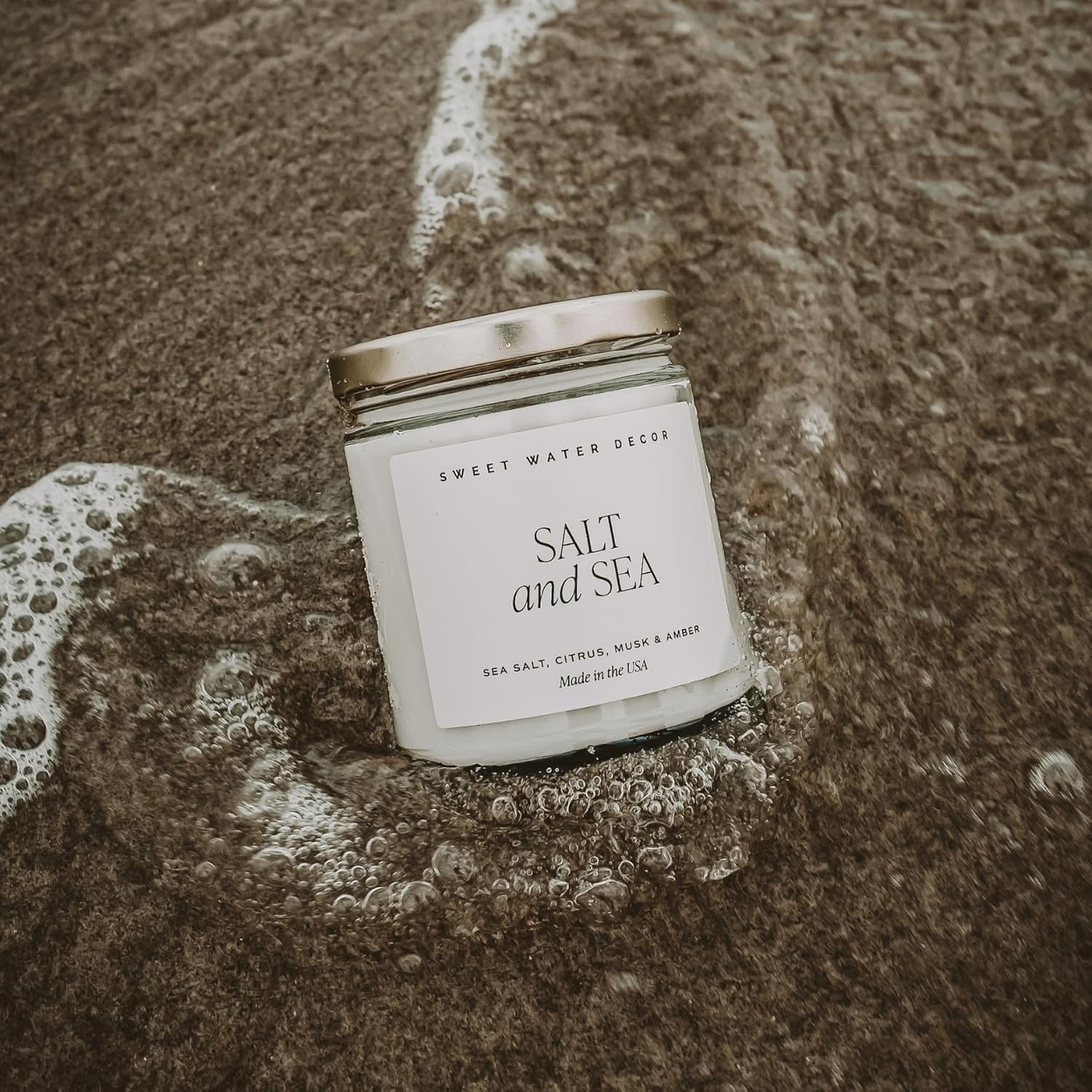 Sweet Water Decor Salt and Sea Candle - Sea Salt, Citrus, Amber, Musk, Beach Scented Soy Candles for Home - Coastal Decor for Beach Lovers - 9oz Clear Jar, 40 Hour Burn Time, Made in The USA