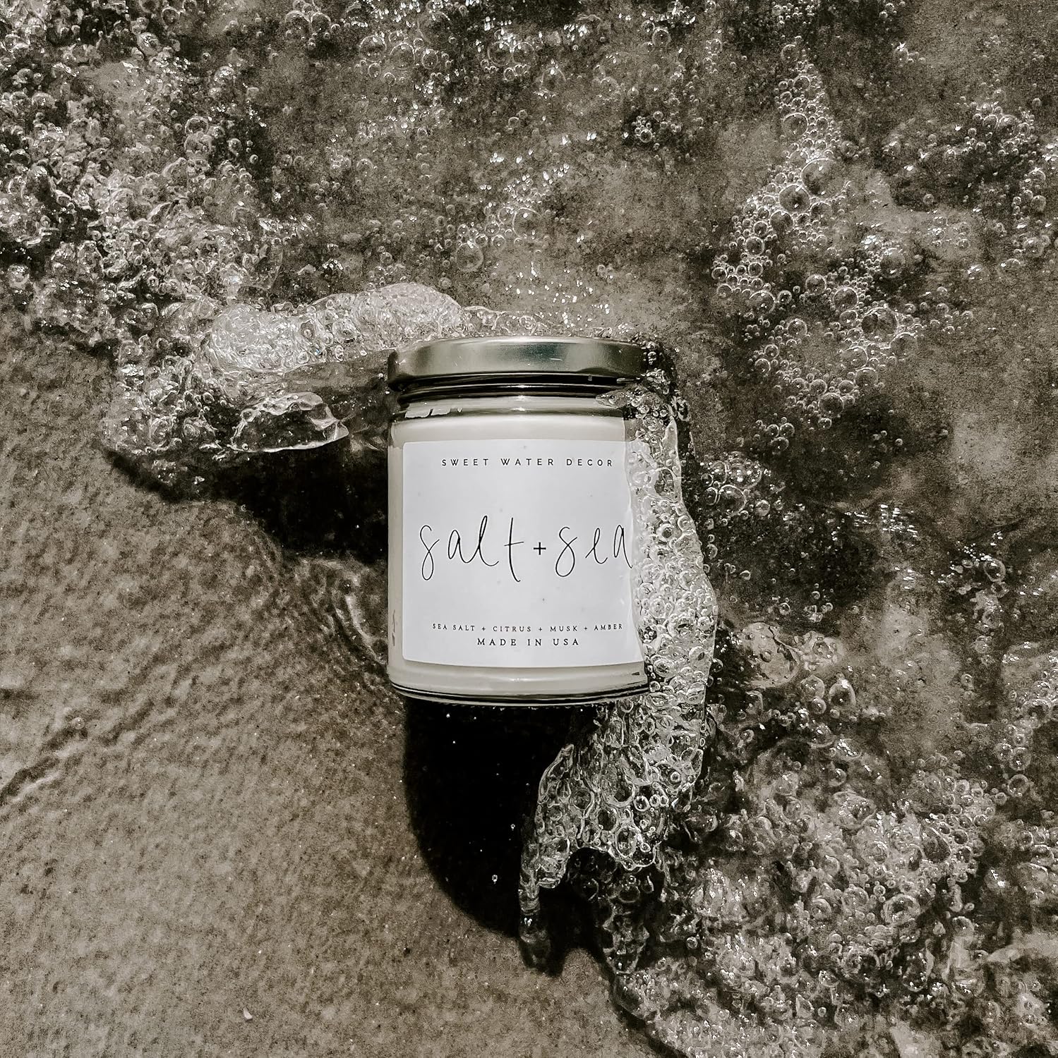 Sweet Water Decor Salt and Sea Candle - Sea Salt, Citrus, Amber, Musk, Beach Scented Soy Candles for Home - Coastal Decor for Beach Lovers - 9oz Clear Jar, 40 Hour Burn Time, Made in The USA